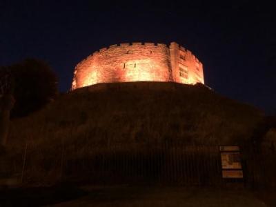 Tamworth Castle lit up in orange